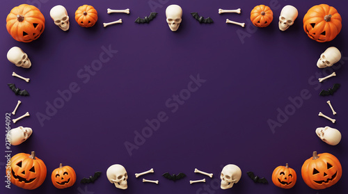Spooky Halloween Flat Lay Background With Pumpkins Skulls And Bats On Purple