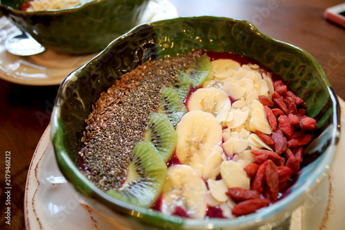 Healthy acai smoothie bowl with chia seeds kiwi banana goji berries