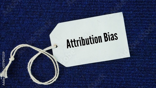 Фотография Tag the paper with the words Attribution Bias