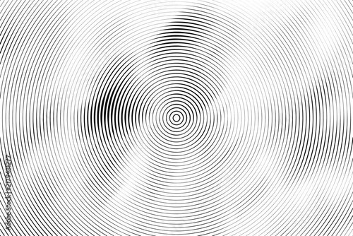 Abstract monochrome background with concentric circles and distorted radial line pattern