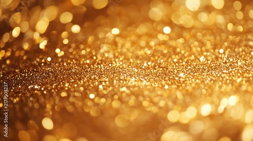 Golden glitter background with bokeh lights