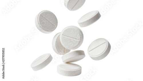фотографія Several white round pills with a dividing line, isolated on transparent backgrou