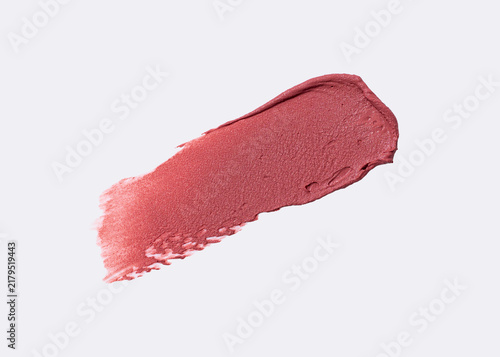 Dusty rose lipstick swatch on white