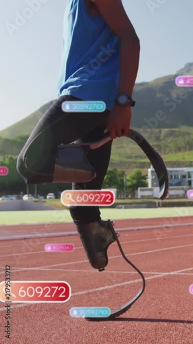 Animation of notifications over african american man with prosthetic legs jumping on running track