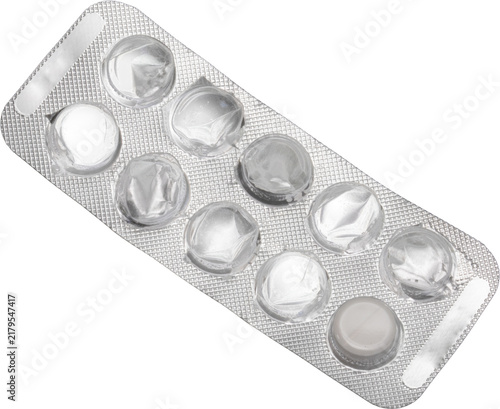 Almost empty silver blister pack with one remaining white pill isolated on transparent background, medical treatment concept