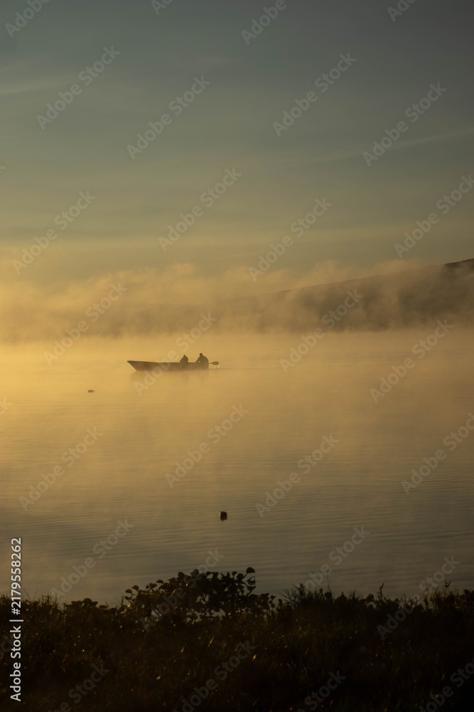 Fototapeta premium Fishermen Fishing on Lake Oloiden at Sunrise, Naivasha, Kenya