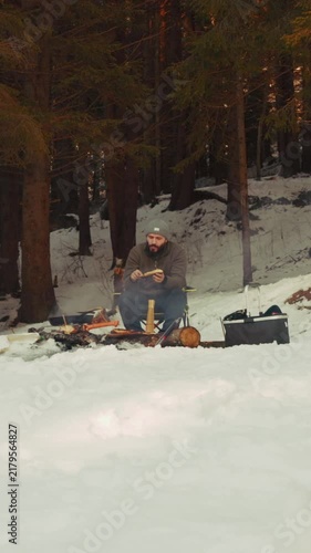 Lumberjack chopping wood with an axe
