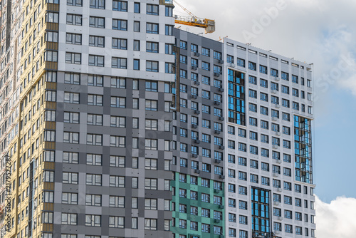 New urban architecture showcases modern building styles in a vibrant city landscape during daylight