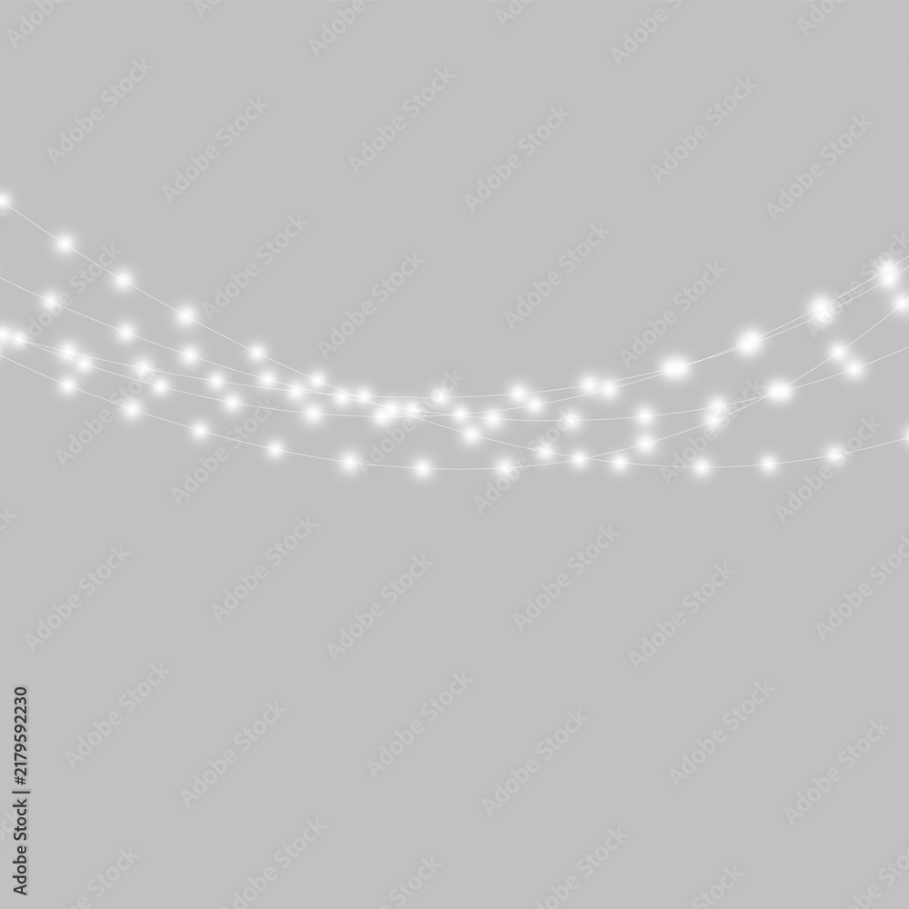 Naklejka premium Strings of soft glowing white lights hang delicately against a deep black background. The bulbs are evenly spaced along curving thin wires with a luminous halo effect.