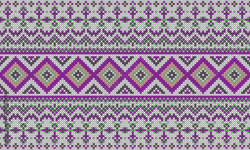 Colorful geometric cross stitch pattern with purple green and pink traditional textile motifs.