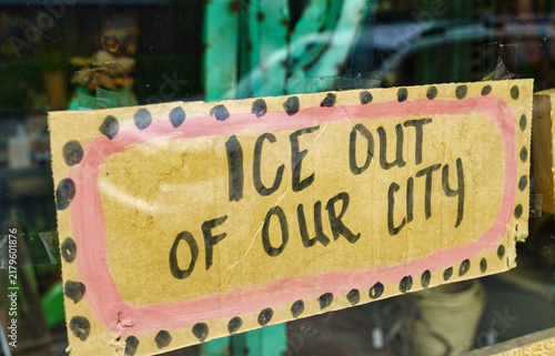 Colorful Anti-Ice sign in a window. USA 2026
