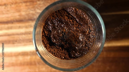 Stop Motion Transformation of Ground Coffee into a Cup of Brewed Coffee