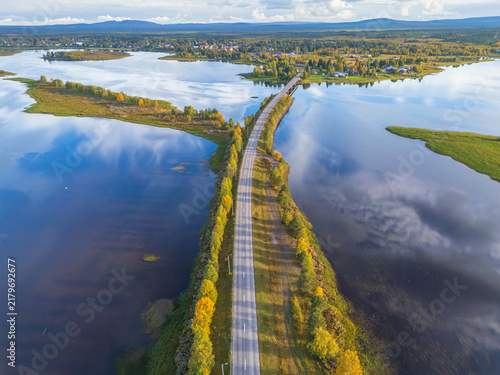 Cuadro en lienzo Aerial view of a scenic causeway road leading through Swedish Lapland towards th