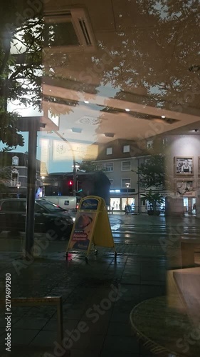 Heavy Rainstorm Seen Through Cafe Window