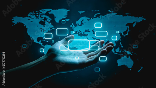 Hand Holding Glowing Digital Interface Over World Map