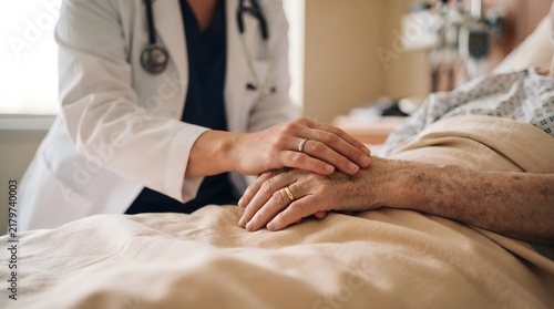 Doctor Gently Holding Elderly Patient's Hand on Hospital Bed, Empathy in Healthcare