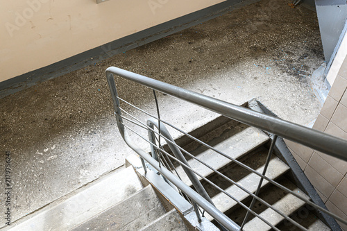 Bild auf Leinwand utilitarian concrete staircase features simple metal railing
