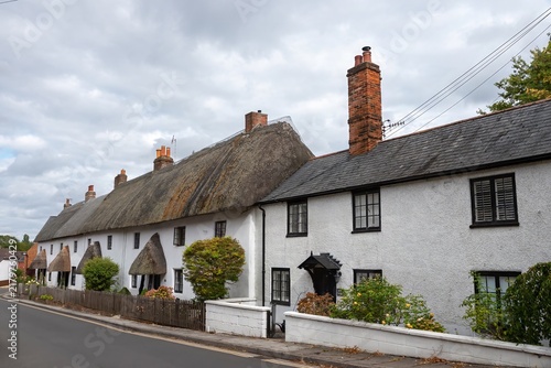 фотографія Salisbury England - August 30 2026: view of thatched cottages in Harnham Road Sa
