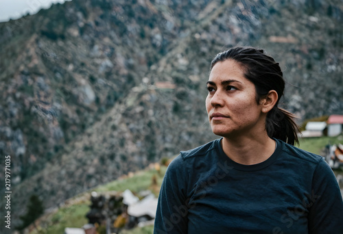 Mindfulness and mental health, thoughtful woman looking at mountain landscape for wellness and connection with nature in remote outdoor environment