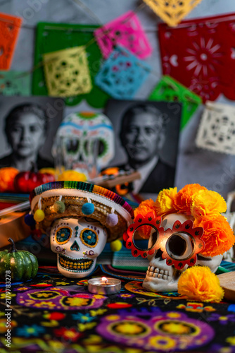 Dia de Muertos altar with calaveras and colorful decorations