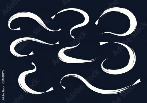 Set of handdrawn white brush stroke swirls and swooshes on dark background
