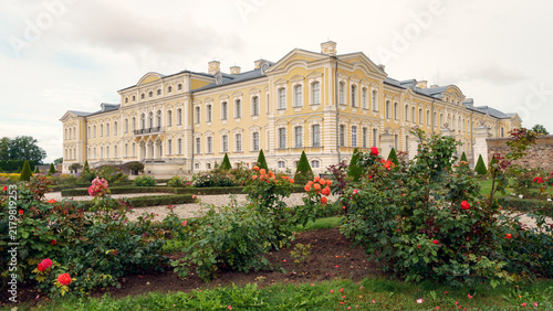 Rundāle Palace facade seen through blooming rose garden in Latvia
