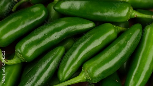Green jalapeno pepper close up, rotation