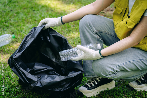 Eco volunteer collects plastic bottles sustainable recycling eff
