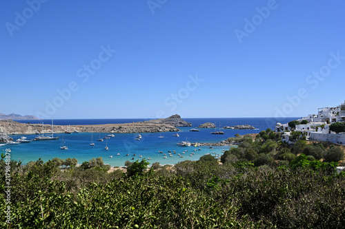 Mediterranean bay with yachts and white coastal houses - Lindos, Rhodes Island, Greece