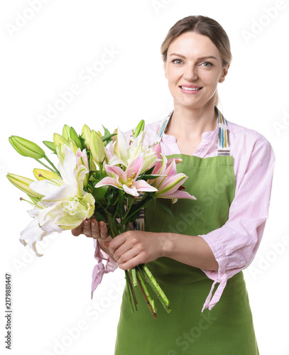 Florist with bouquet of beautiful lilies on white background