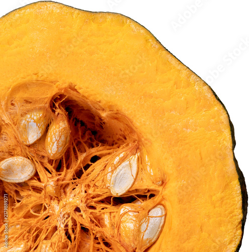 Quadro su tela Macro directly above view of a cut Kabocha pumpkin in the corner showing white s