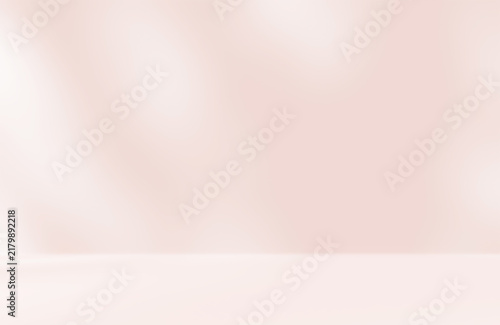 Empty pink colour room studio with sunlight effect shadow on the floor and wall for product presentation. Minimal backdrop design. Cosmetic, beauty and fashion showroom. Summer background mock up.