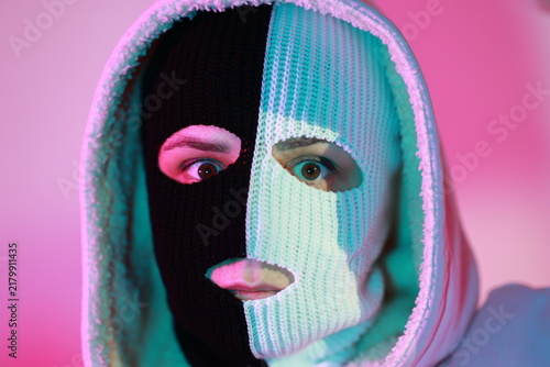 Foto Woman wearing split black and white balaclava
