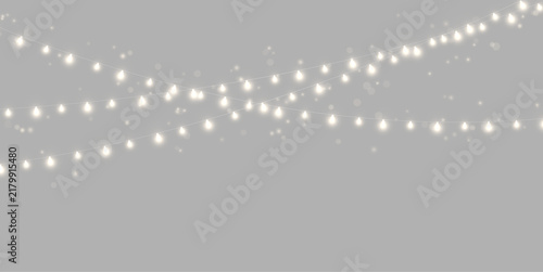 Foto Soft glowing string lights drape across a dark background