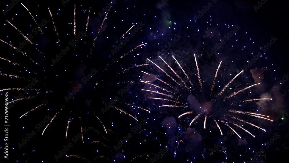 Fototapeta premium twilight fireworks with colorful smoke trails, dazzling night display featuring glowing sparks and gentle mist, spectacular evening fireworks illuminating sky with delicate hues and wispy smoke
