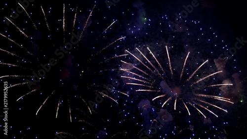 Картината върху платно twilight fireworks with colorful smoke trails, dazzling night display featuring