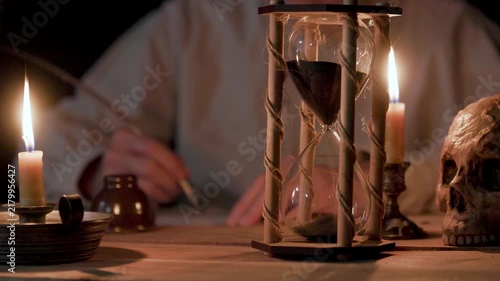 Author Writing with a Feather Quill by Candlelight