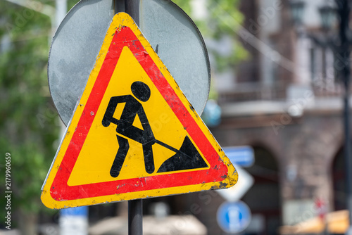 Obraz na plátne Work is underway to repair road signs.
