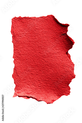 A textured, torn red rectangle, edged with a fine, contrasting border, on a black backdrop