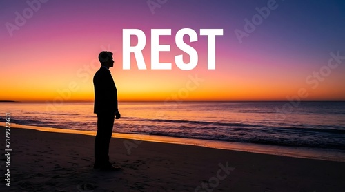 Businessman silhouette standing on beach at sunset with REST text overlay, conceptual work-life balance, mental wellness, corporate burnout recovery, peaceful ocean horizon.