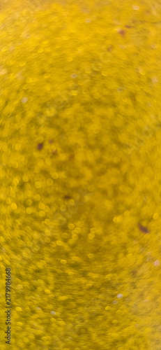 Obraz na plátně Abstract golden-yellow textured background with soft natural patterns and subtle spots