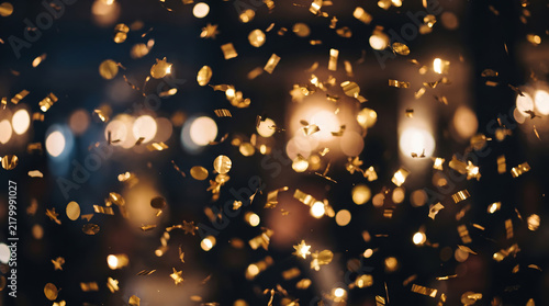 Golden Sparkling Bokeh Particles on Dark Background with Warm Light, Ai Generated