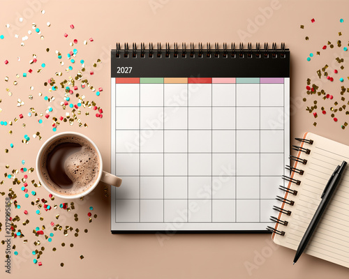 Flat lay 2027 calendar planner with coffee and colorful confetti