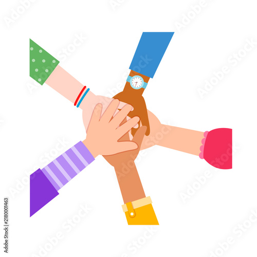 Diverse hands stack in a joyful cooperative gesture symbolizing friendship and teamwork on a white background