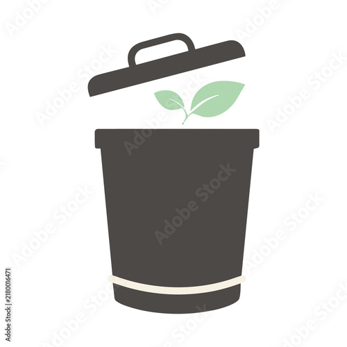 Trash can with plant growing out of it