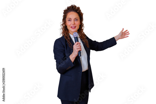 Obraz na płótnie Businesswoman speaking into microphone, presenting and explaining concepts durin