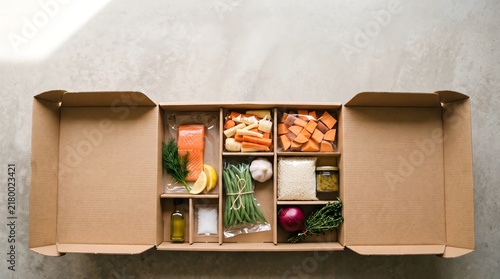 Meal kit box with portioned whole food ingredients, personalized nutrition and custom meal planning concept
