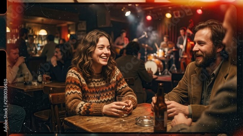 Friends enjoy a lively conversation while drinking beer at a wooden table in a dimly lit jazz club.