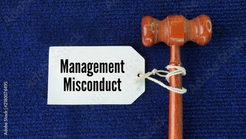 Fotografie Hammer the judge and tag with the word Management misconduct