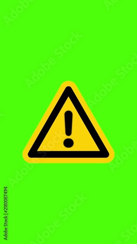 Caution symbol video animation on green screen displaying warning sign with exclamation mark. 4k video